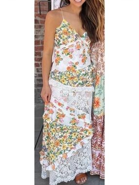 Floral lace dress super pretty. Tie back so it’s adjustable.